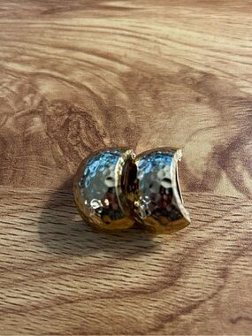 Authentic vintage Christian Dior hammered gold-toned dome clip-on earrings.